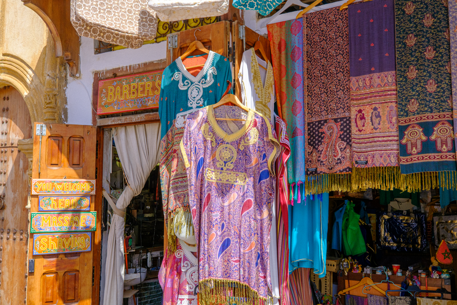 Vibrant textiles and decor in a traditional Rabat bazaar, Morocco.