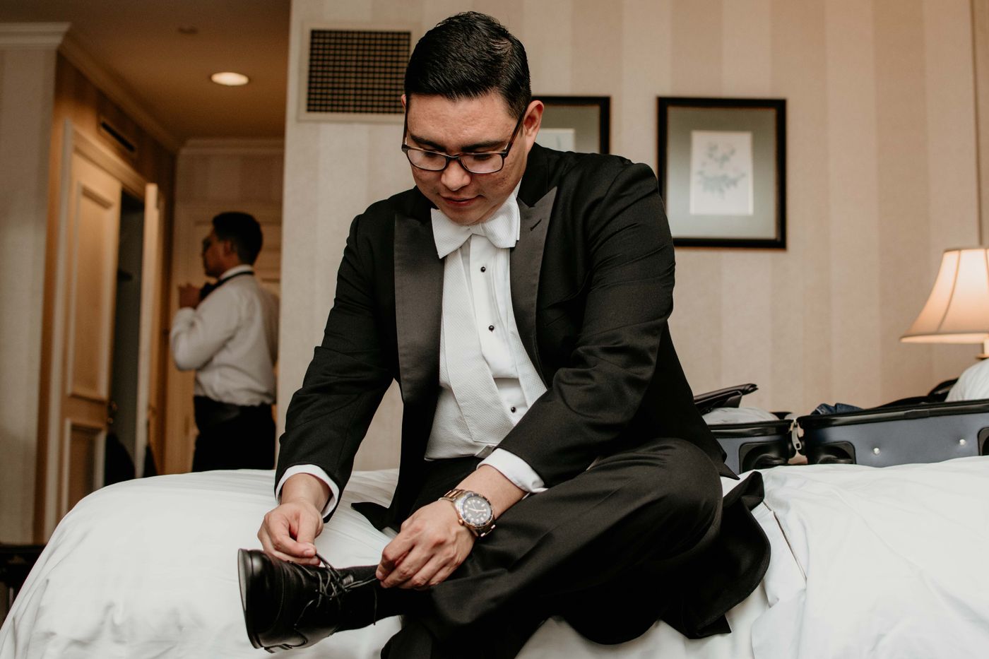 Man tying formal shoes before getting dressed for the day